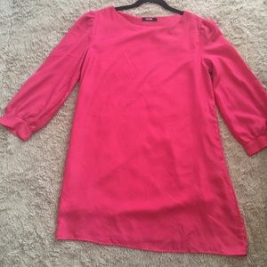 A hot pink long sleeve dress perfect for winter
